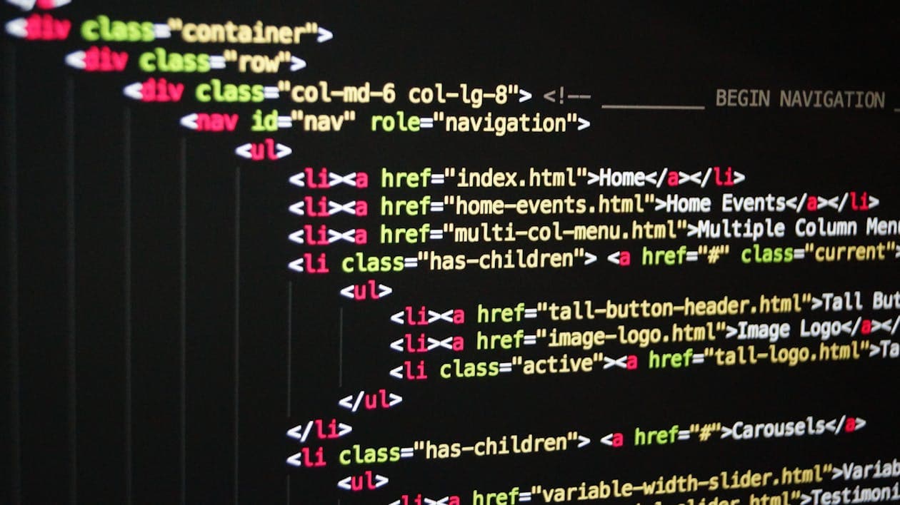 Programming code on a dark screen representing bespoke software development